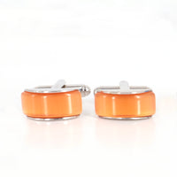 Spherical wedge in orange fiber optic Cufflinks