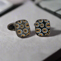 Square gunmetal with enamal blue and yellow Circle