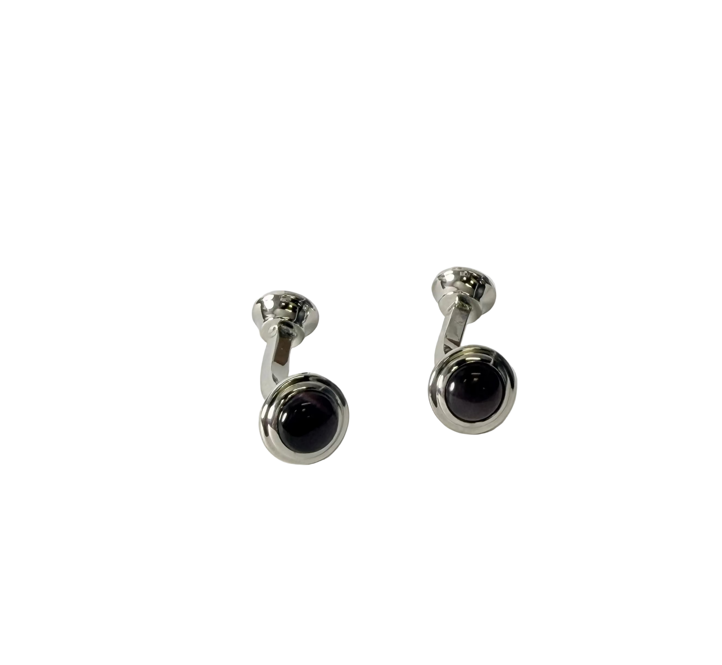 A pair of silver-toned cufflinks with round Brown fiberglass