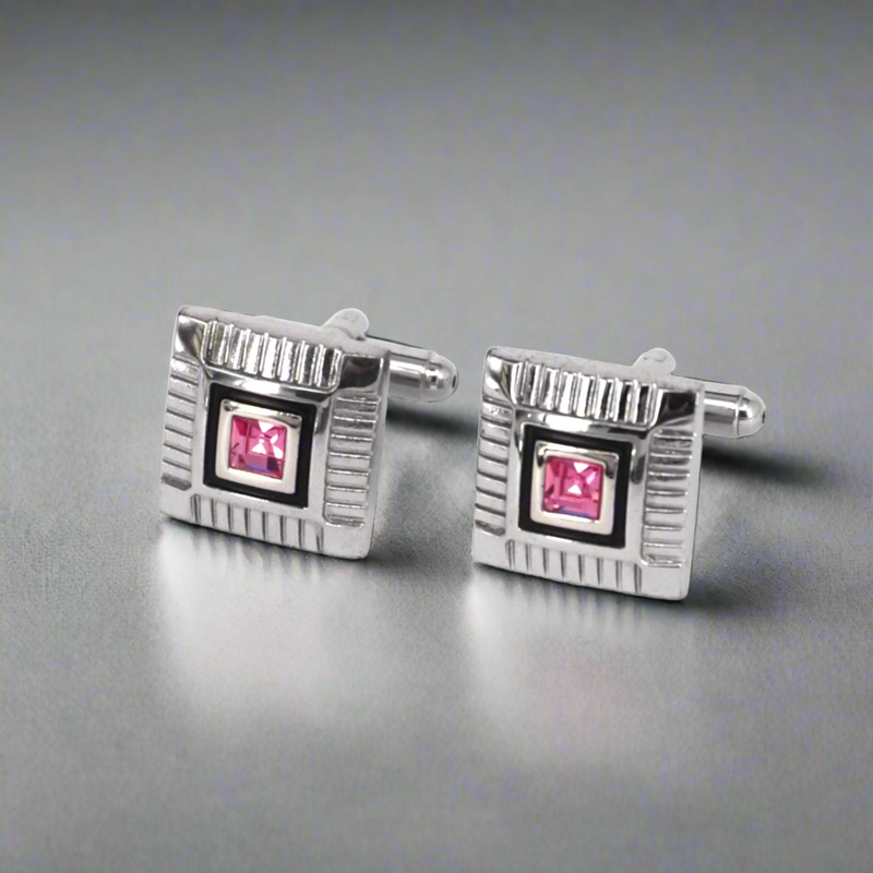 Silver square with one pink crystal