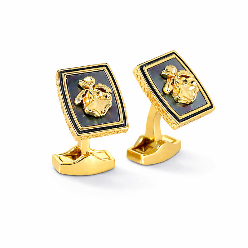 Premium cufflinks inspired by Vanda Miss Joaquim, showcasing elegant gold design with floral motifs.